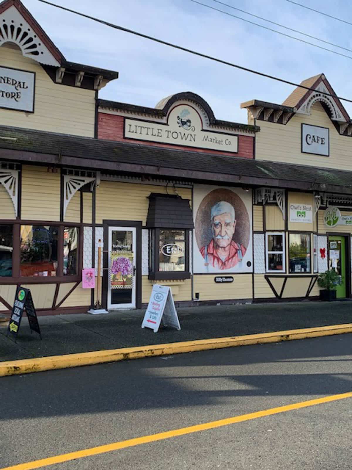 Colorful storefronts with signage and decor.
