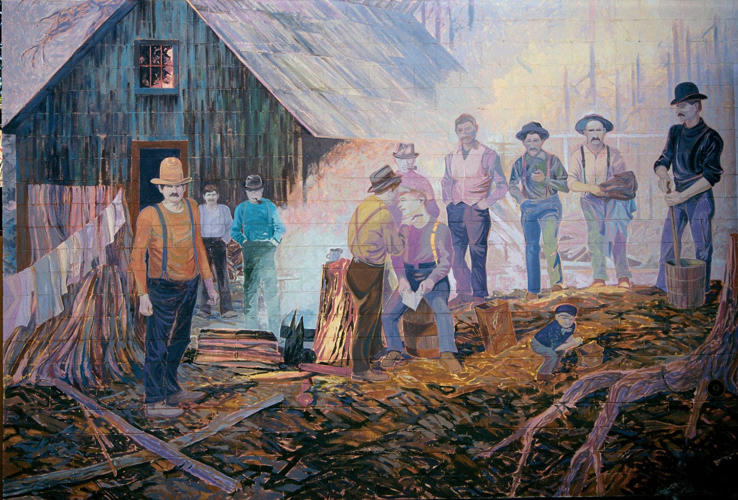 Group of people near a cabin.