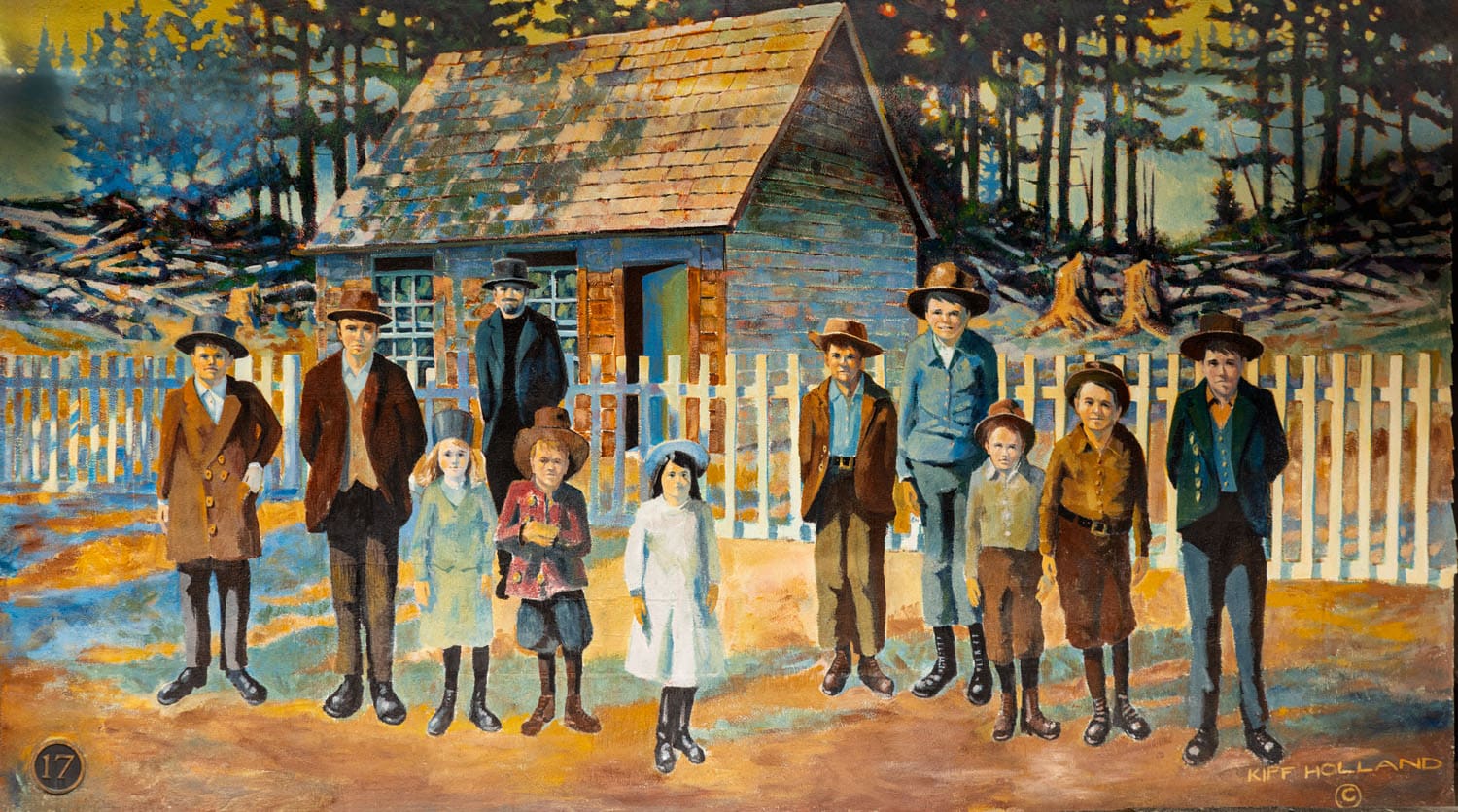 Children and adults in front of schoolhouse.