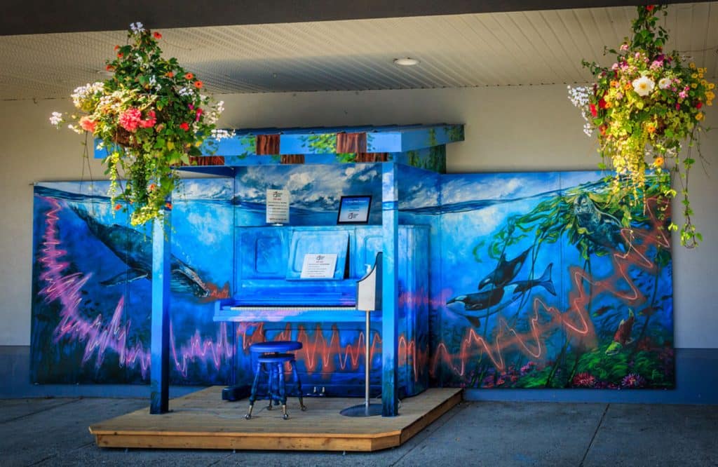 Colorful piano mural with flowers