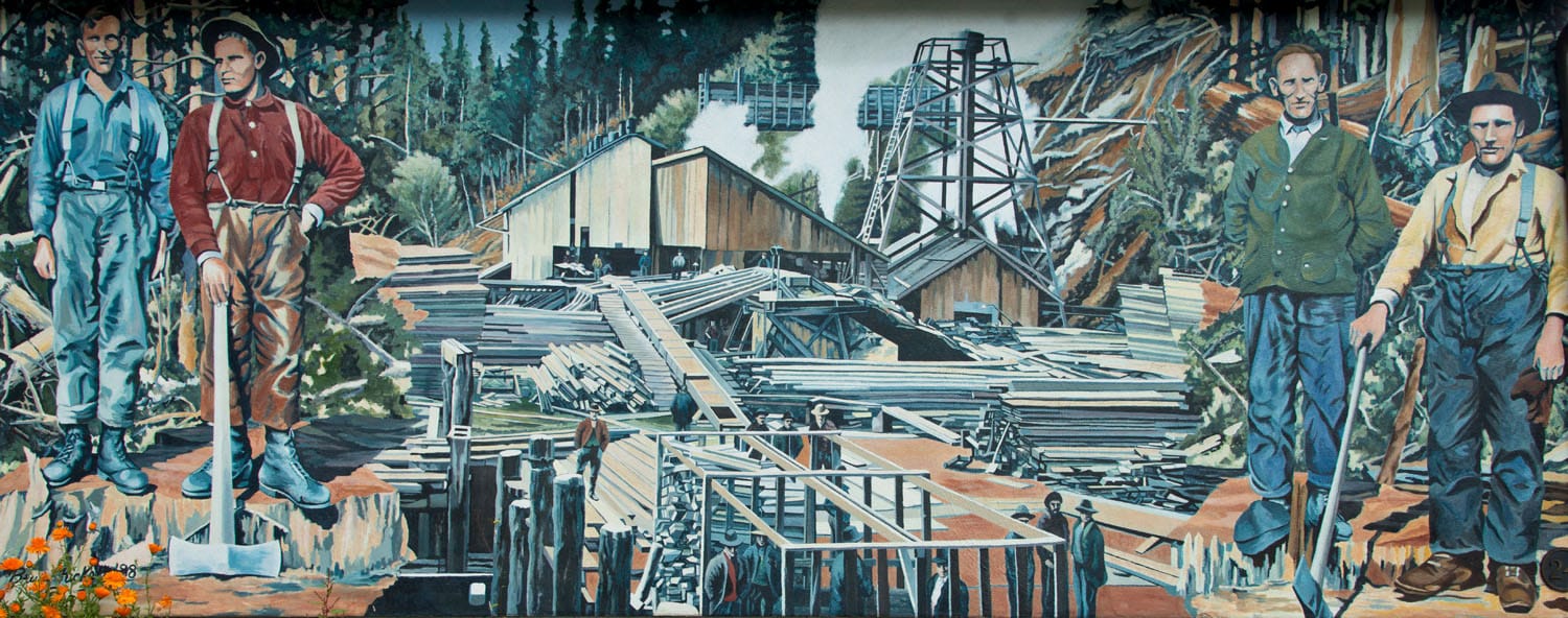 Mural depicting lumber industry workers.