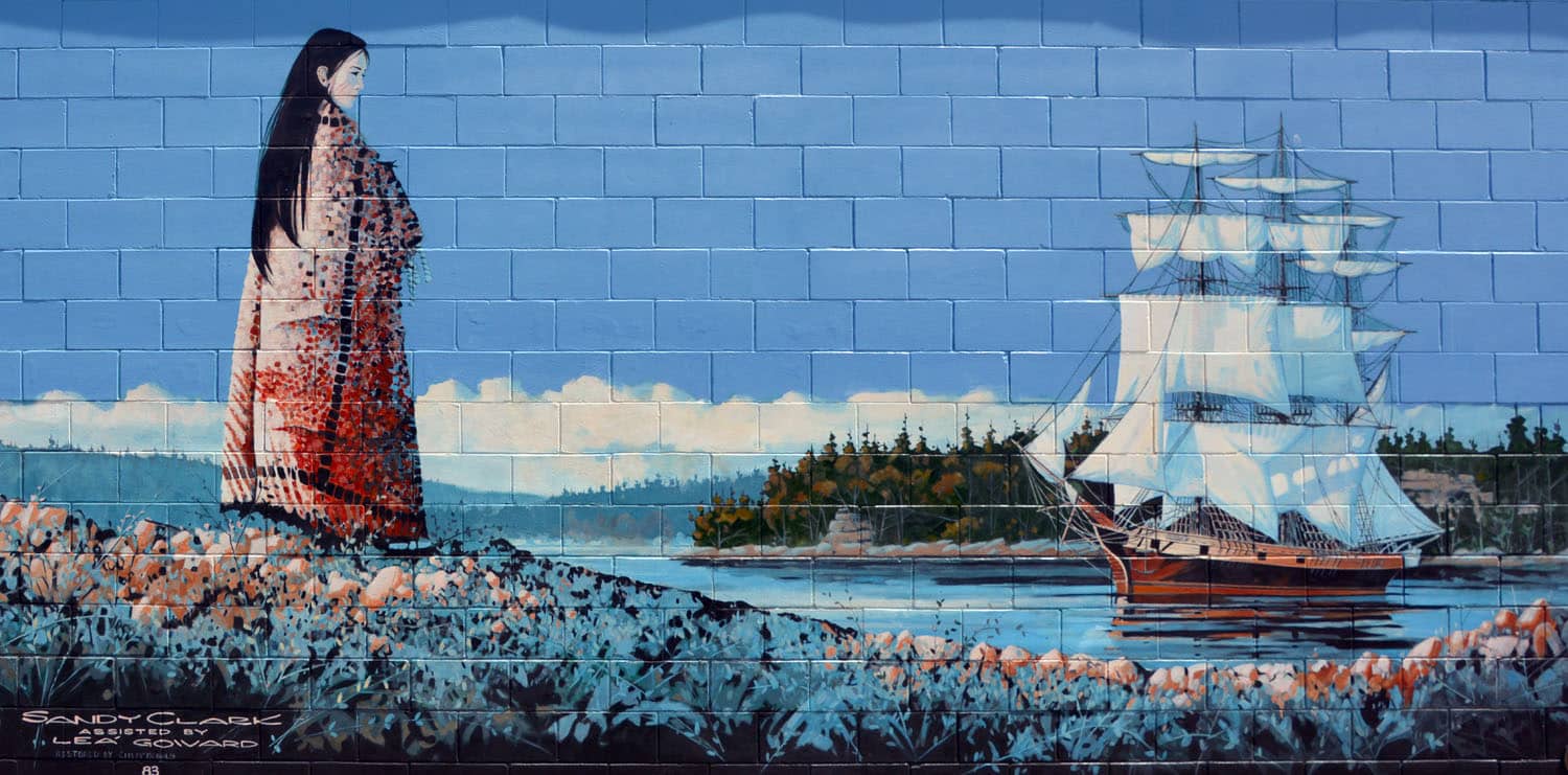 Mural of woman and sailing ship.