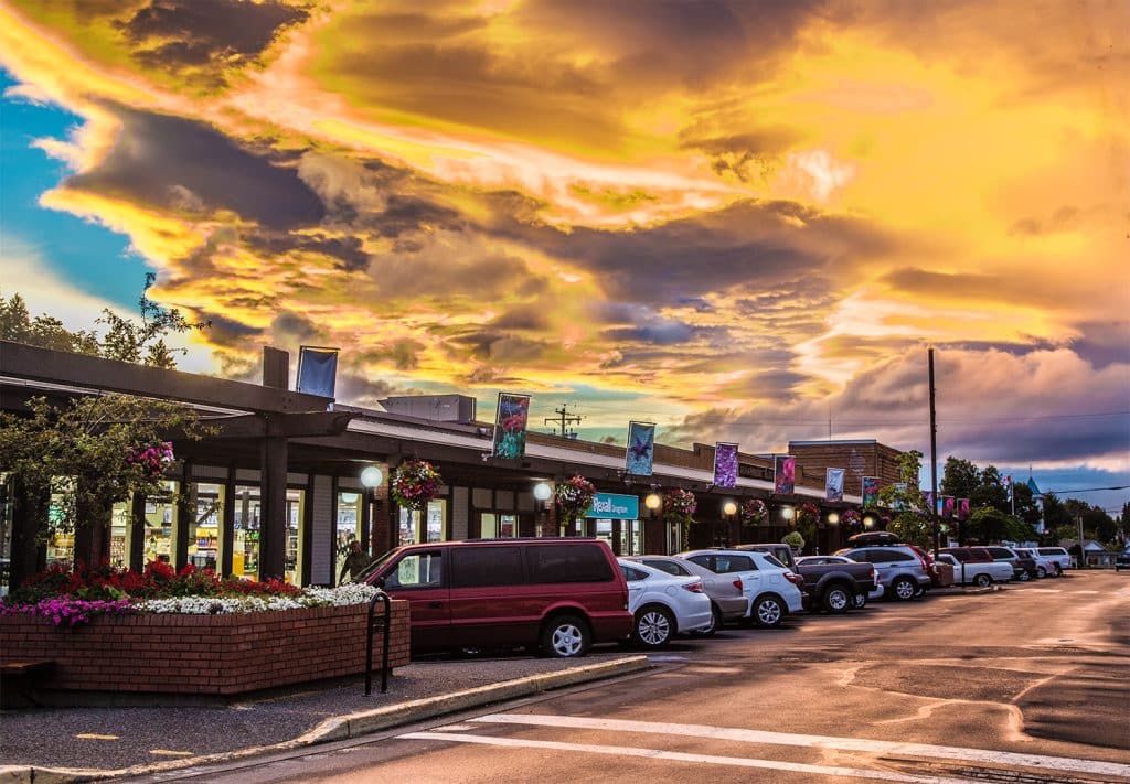 Colorful sunset over a shopping street