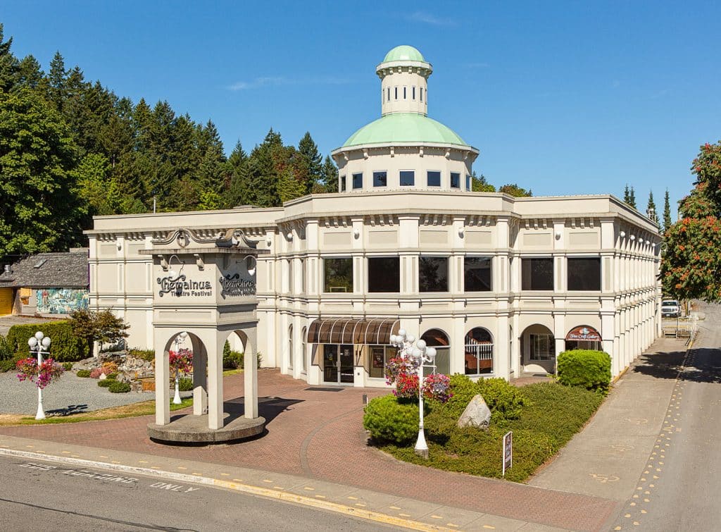 Elegant building with dome and landscaping