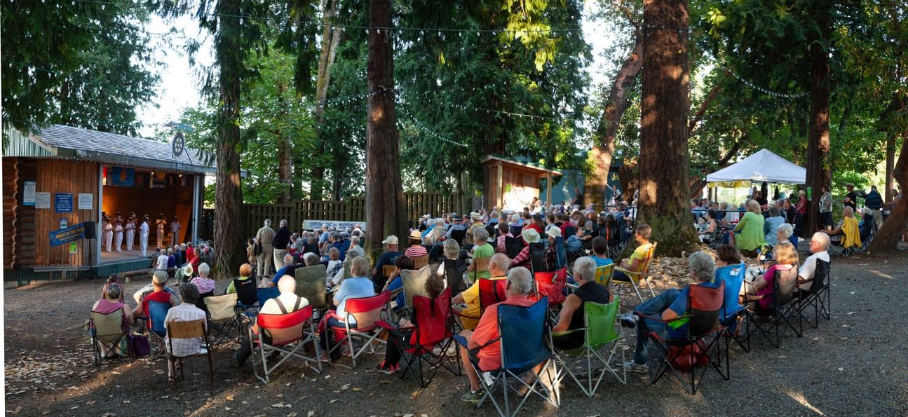 Outdoor performance with large audience.