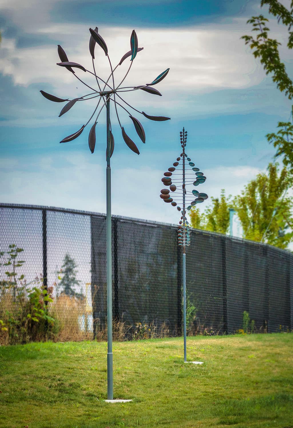 Two artistic wind sculptures in park