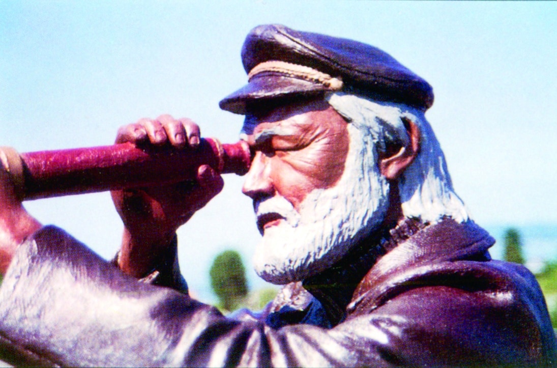 Statue of a sea captain observing