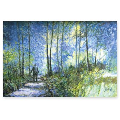 Man walking through a serene forest.