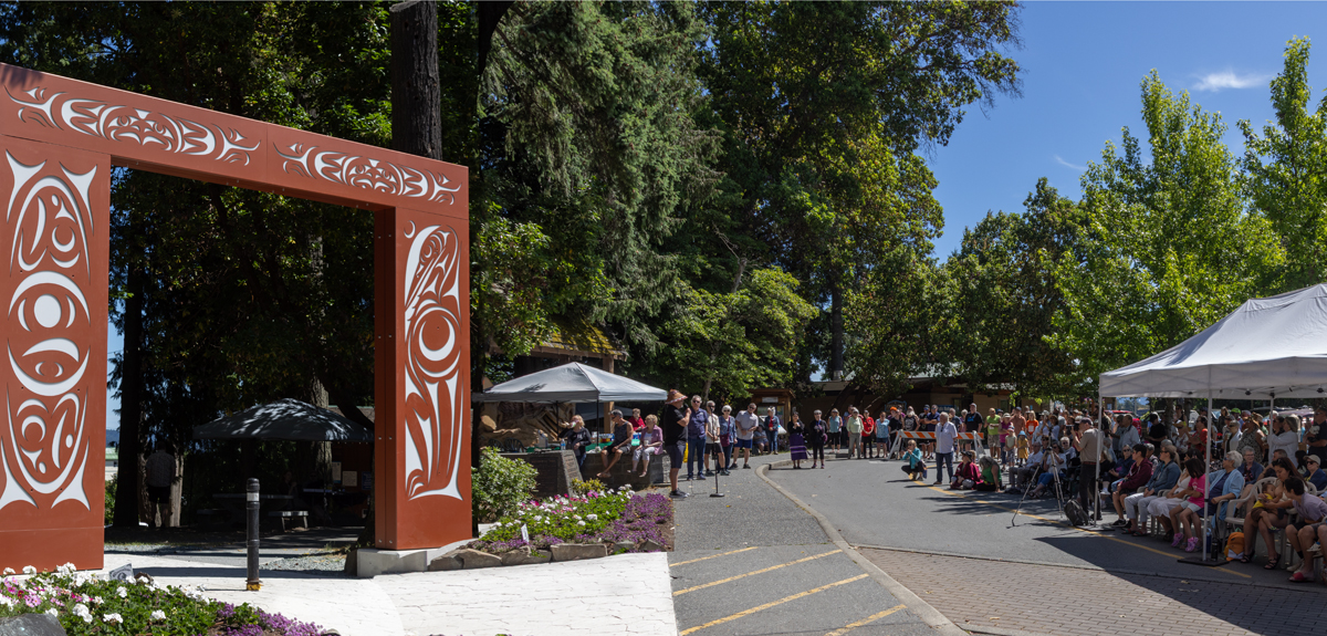 Outdoor gathering with people and art